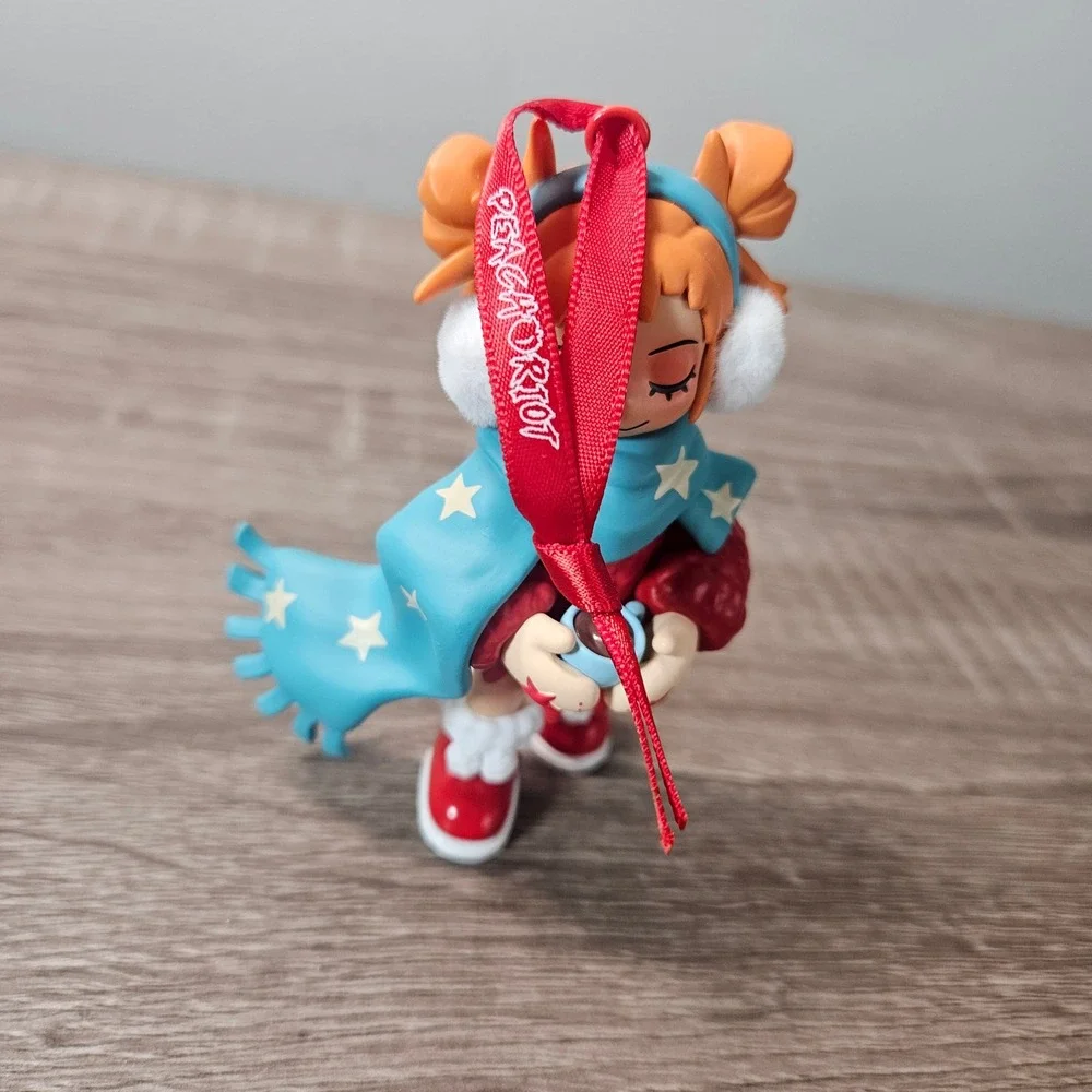 Peach Riot Poppy Winter Series Collectible Hanging Ornament Red Blue Scarf